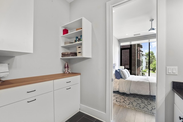 bedroom featuring dark hardwood / wood-style flooring