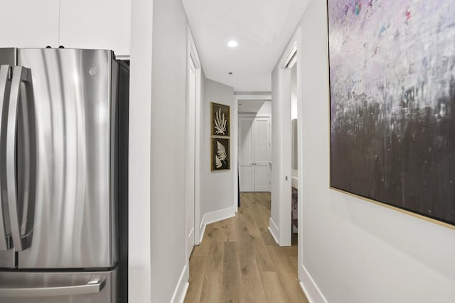 hall featuring light hardwood / wood-style flooring