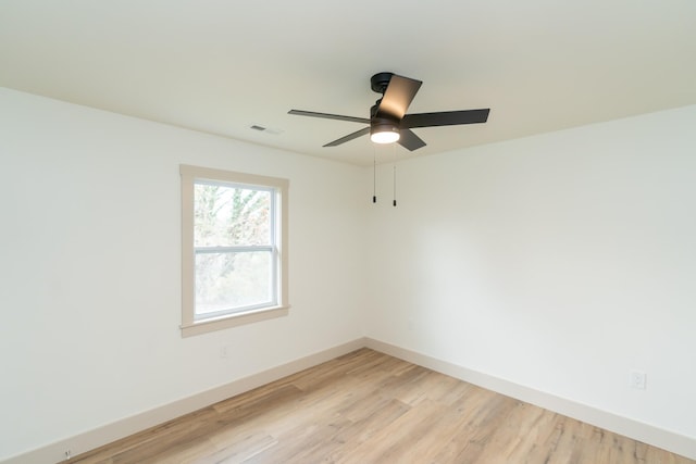 unfurnished room featuring ceiling fan and light hardwood / wood-style flooring