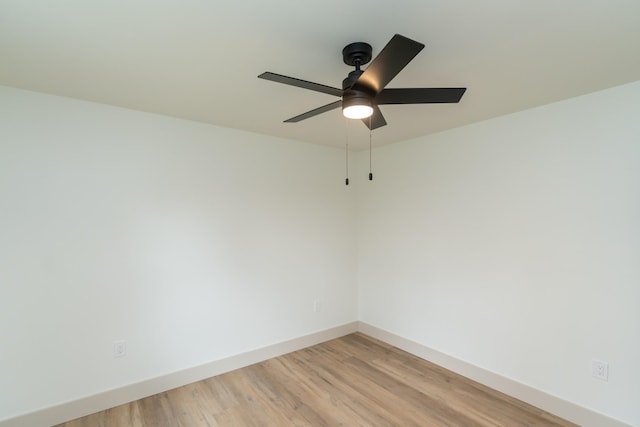 unfurnished room featuring ceiling fan and light hardwood / wood-style flooring