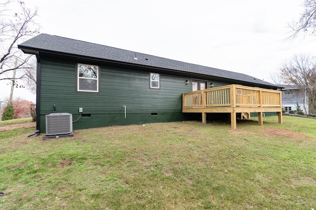 back of house featuring a lawn, central AC unit, and a deck