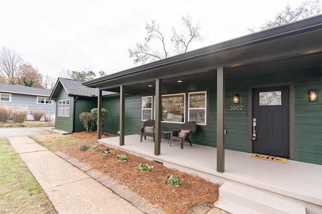 entrance to property with covered porch