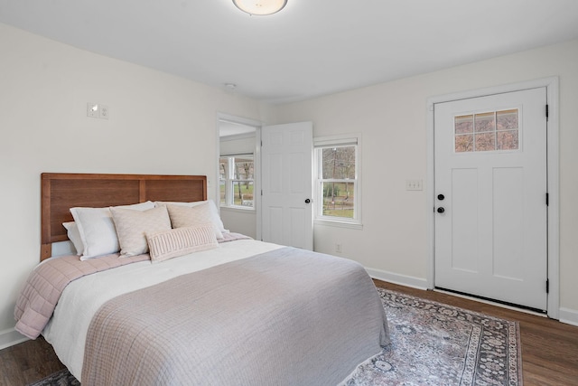 bedroom featuring dark hardwood / wood-style floors