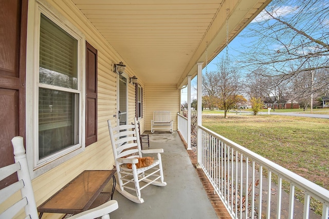 balcony featuring a porch