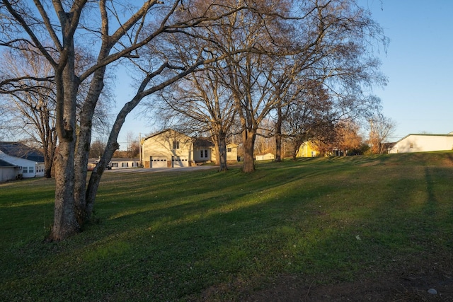 view of yard with a garage