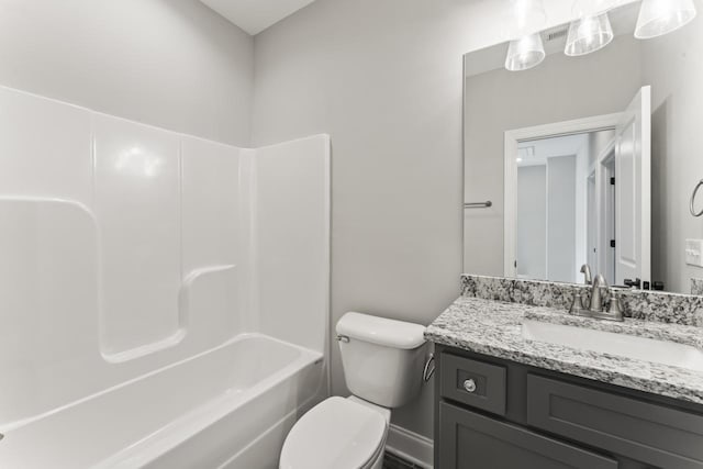 full bathroom featuring vanity,  shower combination, and toilet