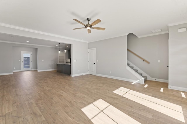 unfurnished living room with ceiling fan, light hardwood / wood-style floors, and ornamental molding