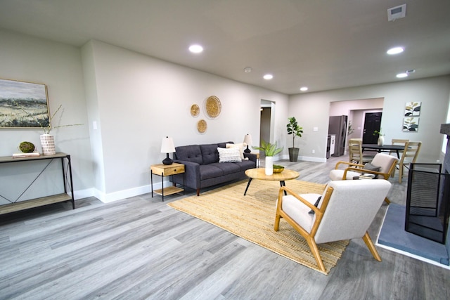 living room featuring light hardwood / wood-style floors