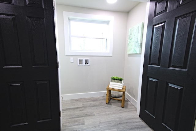 entrance foyer featuring light wood-type flooring