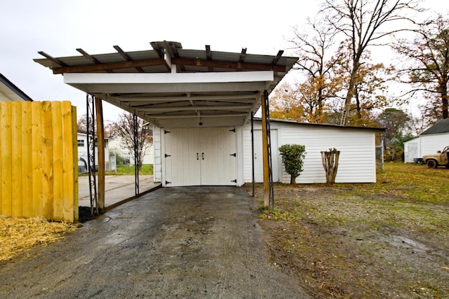 view of parking / parking lot with a carport