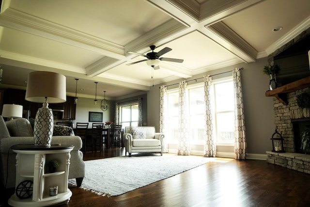 living room with dark hardwood / wood-style flooring, crown molding, and coffered ceiling