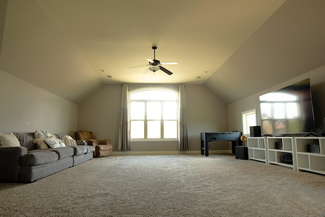 additional living space with lofted ceiling, ceiling fan, and carpet floors