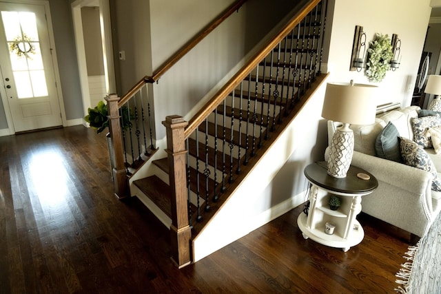 stairs with wood-type flooring