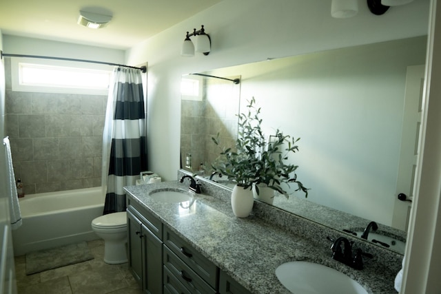 full bathroom with tile patterned flooring, vanity, toilet, and shower / tub combo with curtain