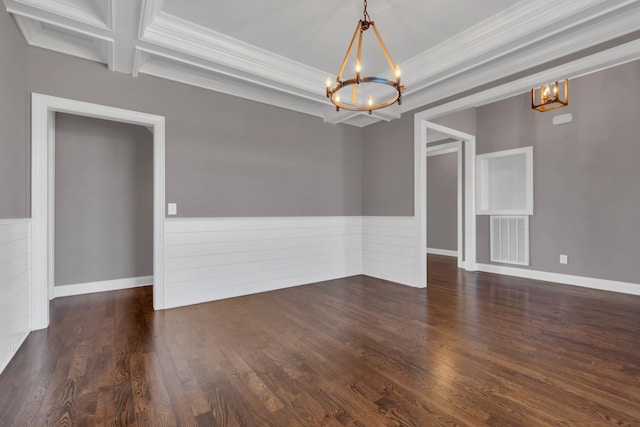 spare room with visible vents, a wainscoted wall, beamed ceiling, wood finished floors, and an inviting chandelier