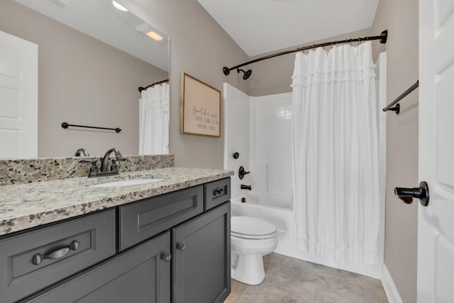 full bath featuring tile patterned floors, vanity, toilet, and shower / bath combo with shower curtain