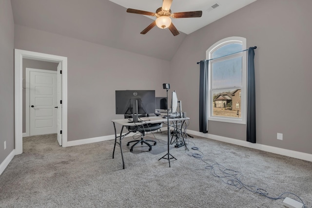 office space featuring carpet floors, lofted ceiling, and baseboards