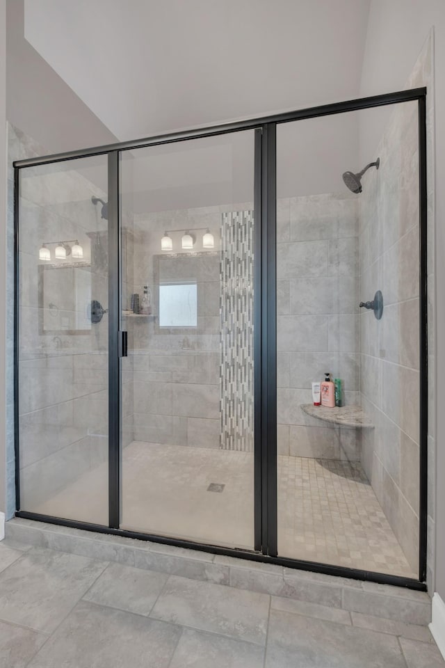 bathroom with a shower stall