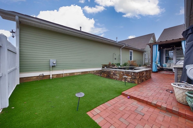 view of yard with a patio area