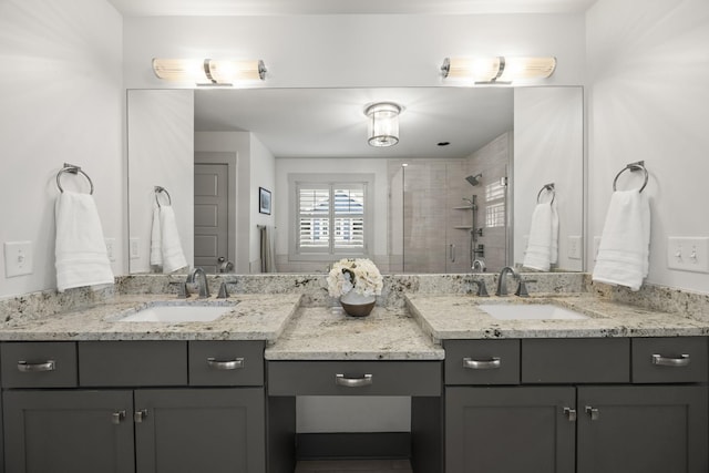 bathroom with vanity and an enclosed shower