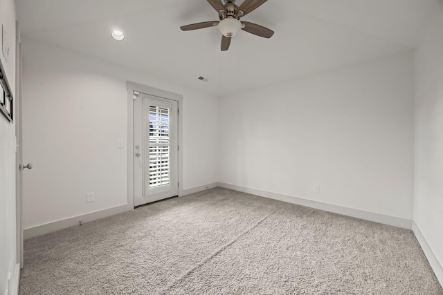 carpeted empty room with ceiling fan