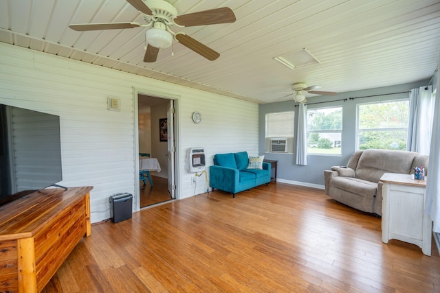 unfurnished sunroom featuring heating unit and cooling unit