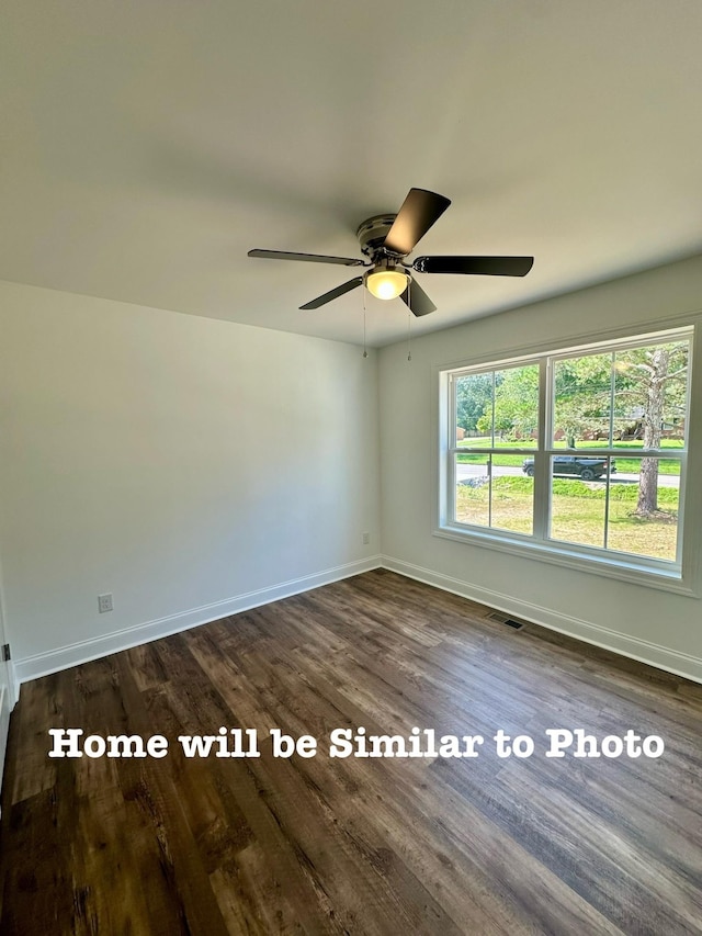 unfurnished room with dark hardwood / wood-style floors