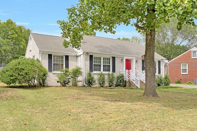 ranch-style house with a front lawn