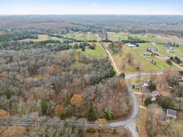 birds eye view of property featuring a rural view