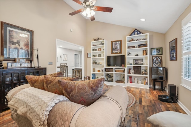 living room featuring ceiling fan, high vaulted ceiling, and wood-type flooring