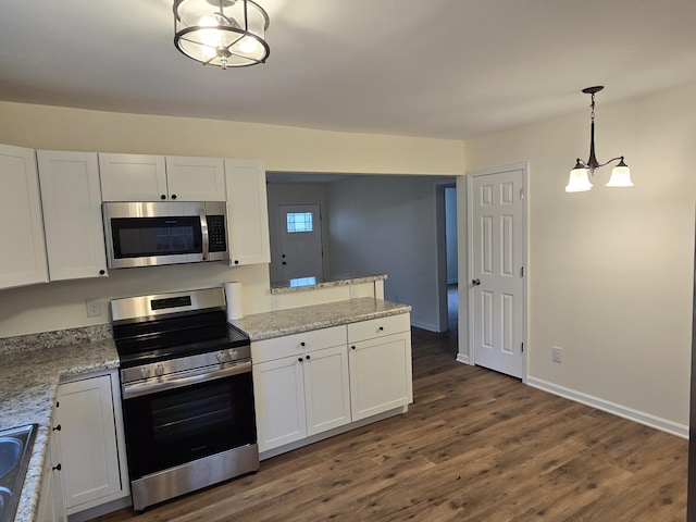 kitchen featuring pendant lighting, an inviting chandelier, white cabinets, dark hardwood / wood-style floors, and stainless steel appliances