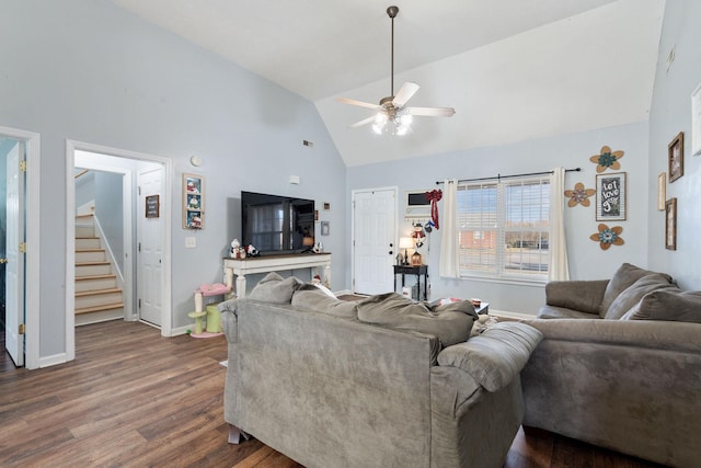 living room with ceiling fan, dark wood-type flooring, and high vaulted ceiling