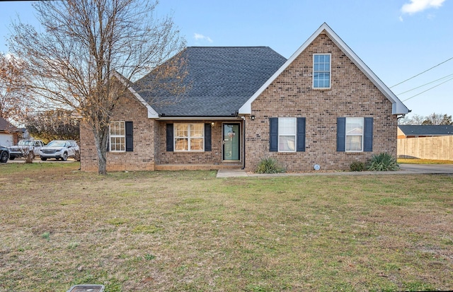 view of front of home with a front yard