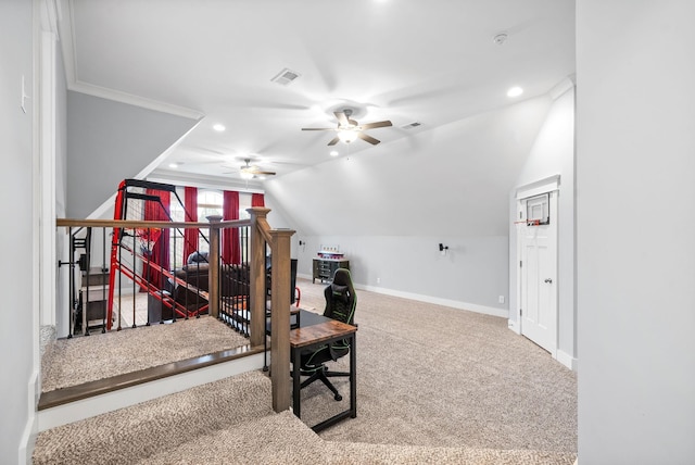 exercise area featuring ceiling fan, crown molding, carpet, and vaulted ceiling