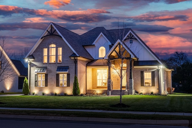 view of front of home featuring a yard