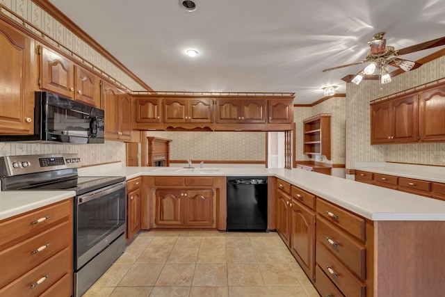 kitchen with black appliances, sink, kitchen peninsula, and crown molding