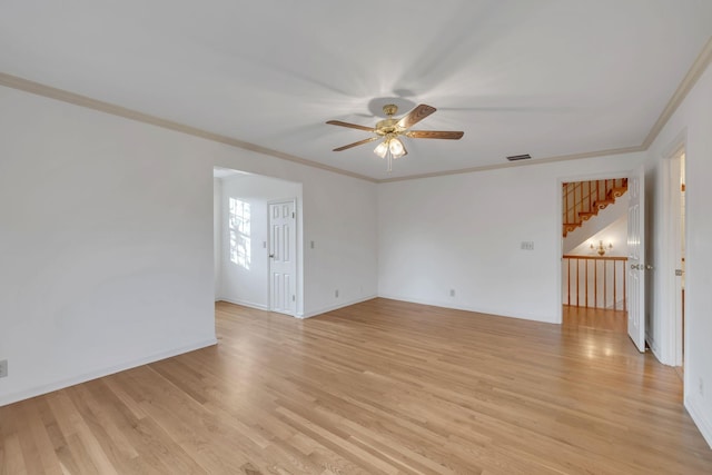 unfurnished room featuring crown molding, ceiling fan, and light hardwood / wood-style floors