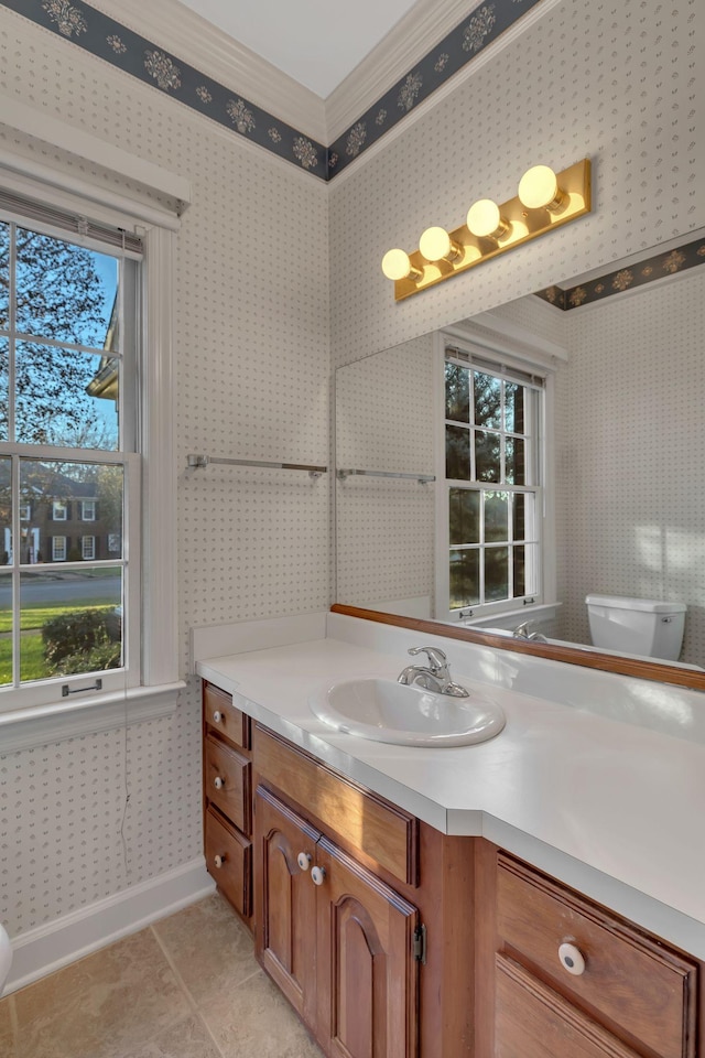 bathroom with tile patterned floors, vanity, and toilet