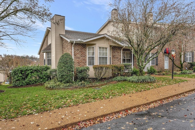 view of property exterior featuring a yard