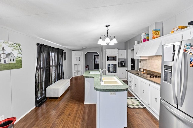 kitchen with black appliances, white cabinets, a center island with sink, sink, and tasteful backsplash