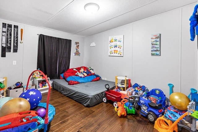 bedroom featuring hardwood / wood-style flooring