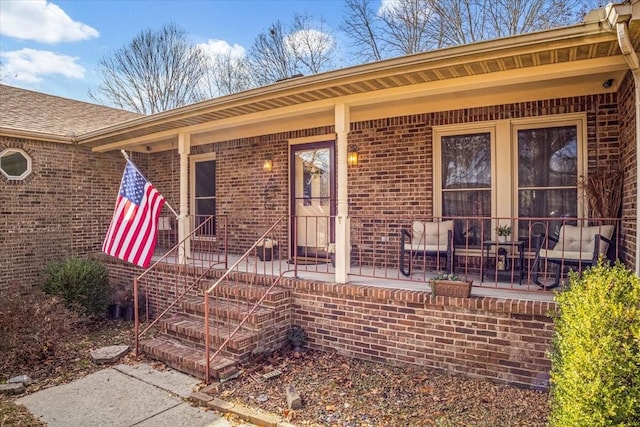 doorway to property featuring a porch