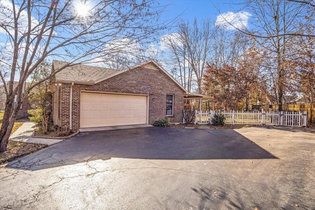 view of home's exterior with a garage