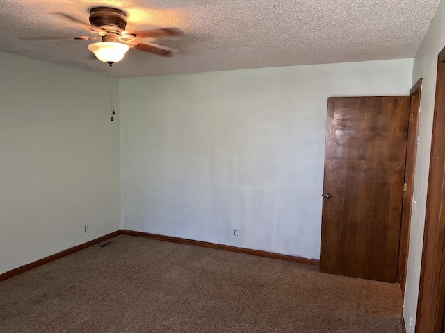 unfurnished room with carpet, a textured ceiling, and ceiling fan