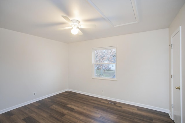 empty room featuring dark hardwood / wood-style floors and ceiling fan