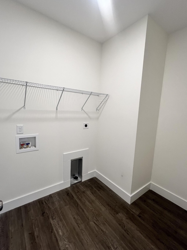 washroom featuring washer hookup, dark hardwood / wood-style floors, and electric dryer hookup