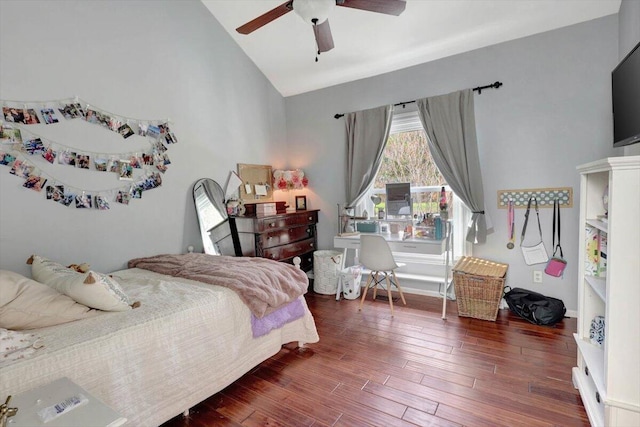 bedroom featuring vaulted ceiling, ceiling fan, and dark hardwood / wood-style floors