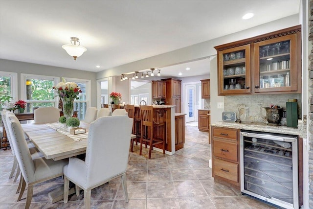 dining room featuring beverage cooler