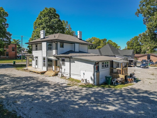 view of front of property featuring a sunroom