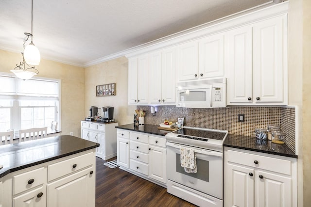 kitchen with white cabinets, pendant lighting, white appliances, and dark hardwood / wood-style floors